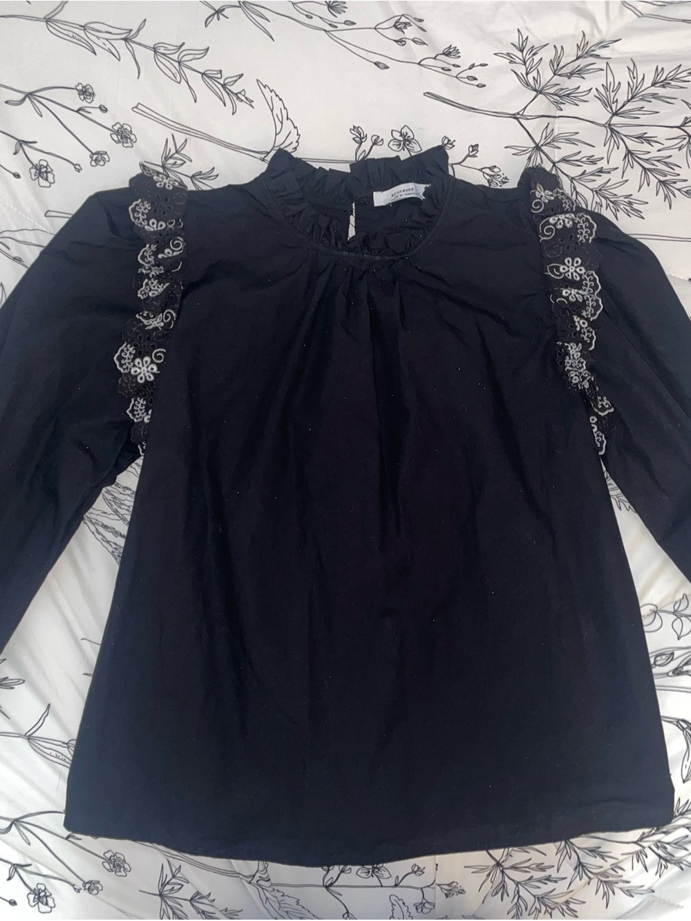 Reserved Black Long-Sleeve Ruffle-Neck Blouse with White Embroidery